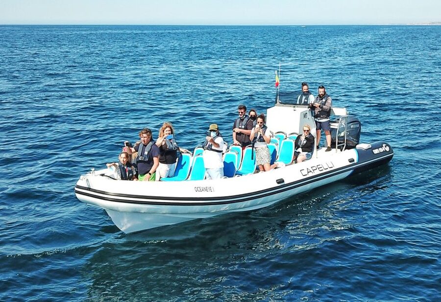 Albufeira: Benagil Cave and Dolphin Sightseeing Boat Cruise - Alfanzina Lighthouse marks the western turn