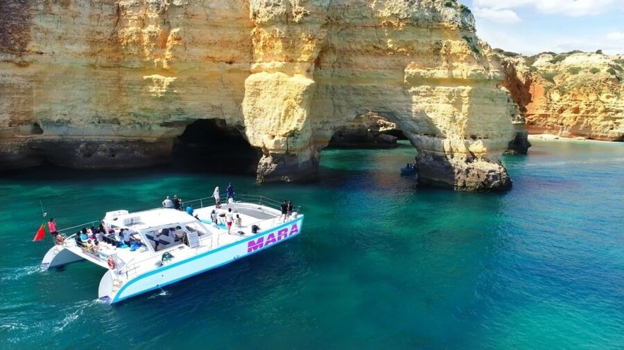Albufeira: Catamaran Cruise with BBQ & Open Bar on the Beach - Getting close to Benagil’s caves