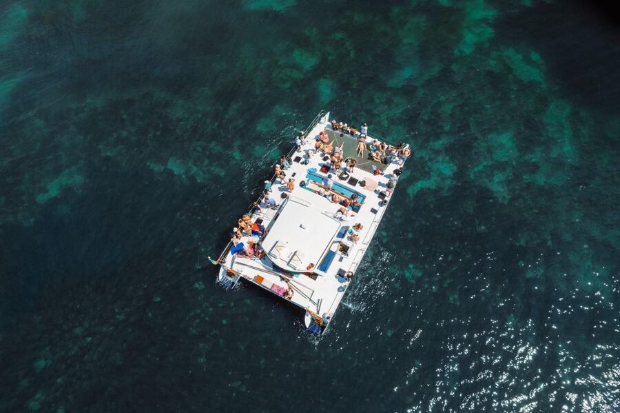 Albufeira: Caves and Coastline Catamaran Cruise to Benagil - The swim stop and life on the catamaran