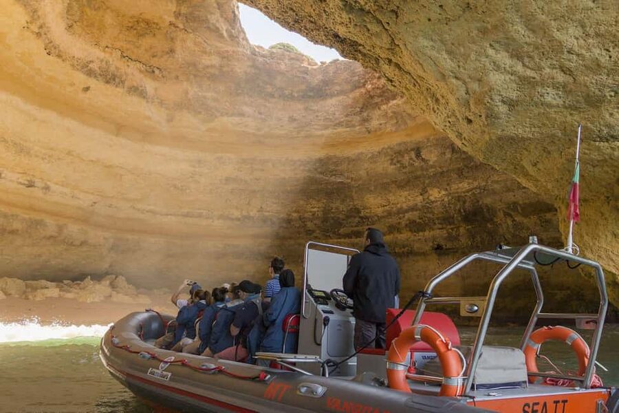Albufeira: Dolphin Watching and Benagil Cave Boat Cruise - Searching open water for dolphins