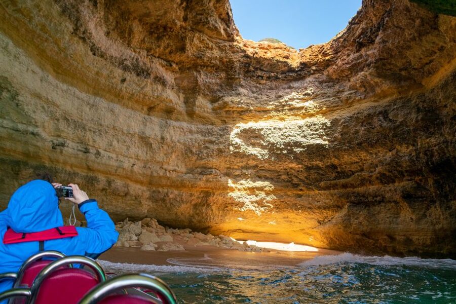 Albufeira: Dolphins, Benagil Caves and Coastline Boat Tour - Along the Algarve coast toward Benagil