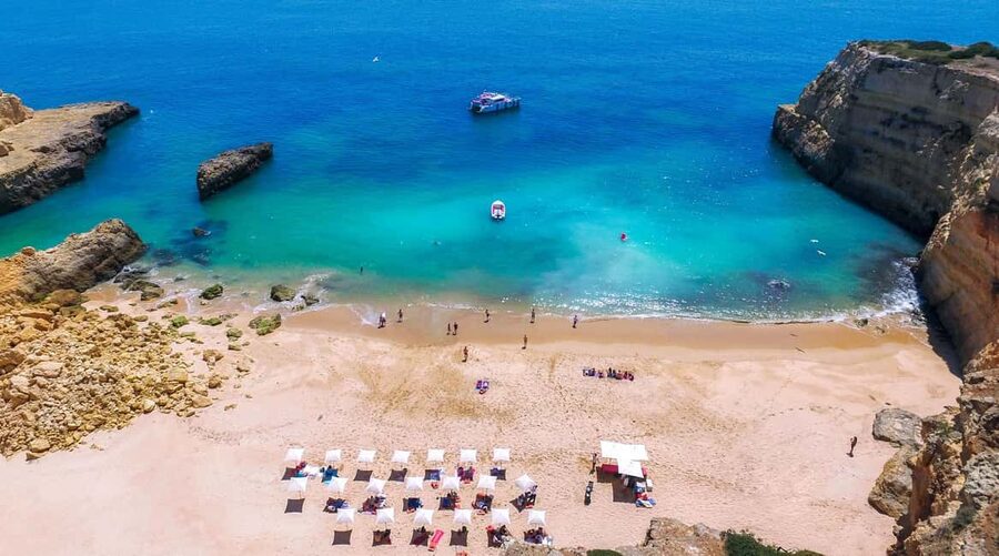 Albufeira: Sightseeing Cruise with Beach BBQ and Open Bar - Landing by dinghy at a secluded beach