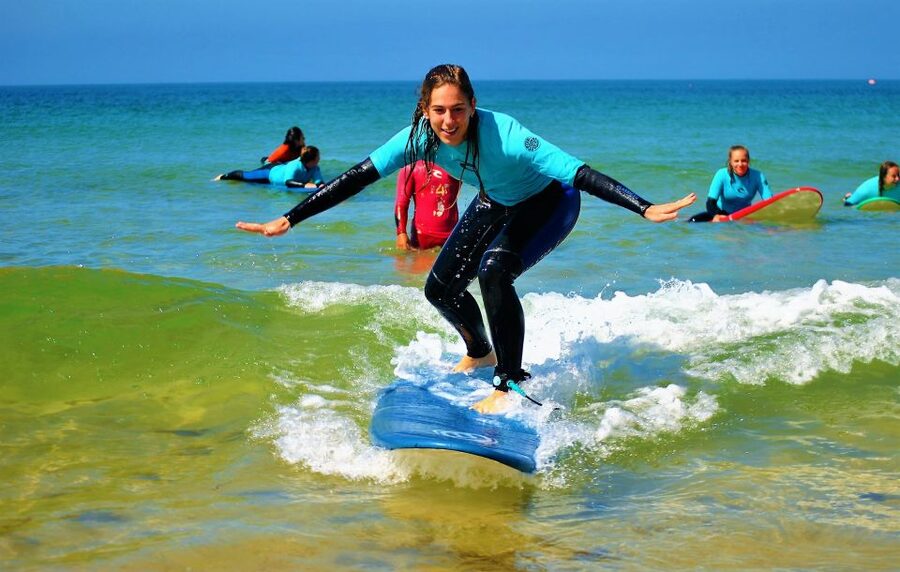 Albufeira: Surfing Lesson at Galé Beach - The warm-up turns nerves into useful movement