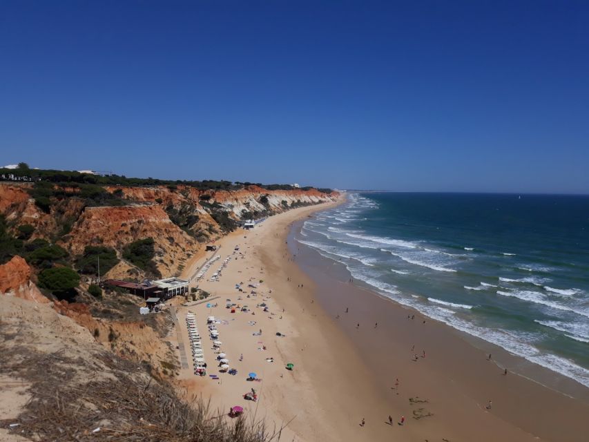 Albufeira: Tuk-tuk Sightseeing Tour - Falésia Beach is the visual centerpiece