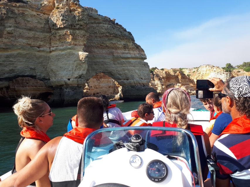 Algarve: Boat Trip to the Caves of Benagil - Watching for dolphins along the Algarve coast