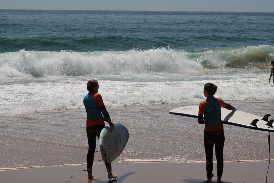 Algarve: Group Surfing Lesson - Pickup from Carvoeiro, Lagos, Lagoa, or Portimão