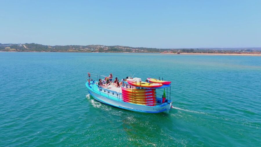 Alvor: Explore Caves Boat and Kayak Tour - The return cruise is part of the fun