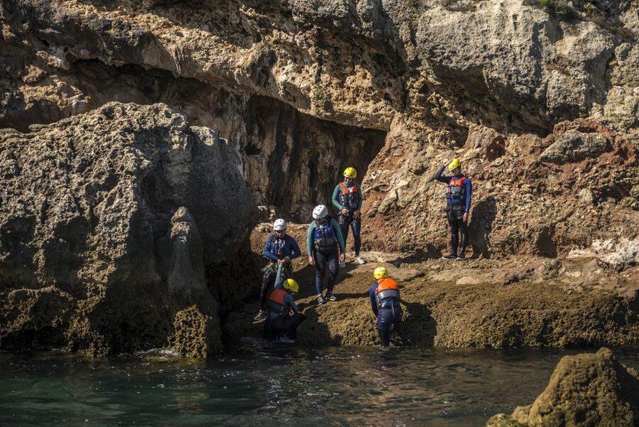 Arrábida: Setubal, Sesimbra Coasteering & Speedboat Tour - Swimming through Arrábida’s clear bays