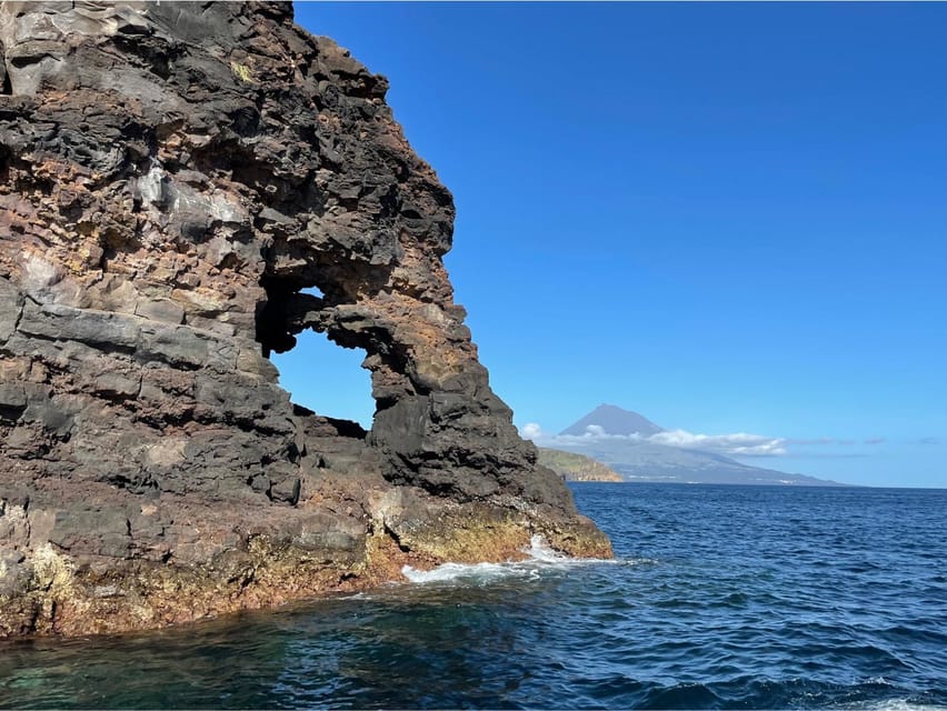 Faial Island: Unique boat tour to the Capelinhos volcano - The Capelinhos lighthouse and the volcanic coast