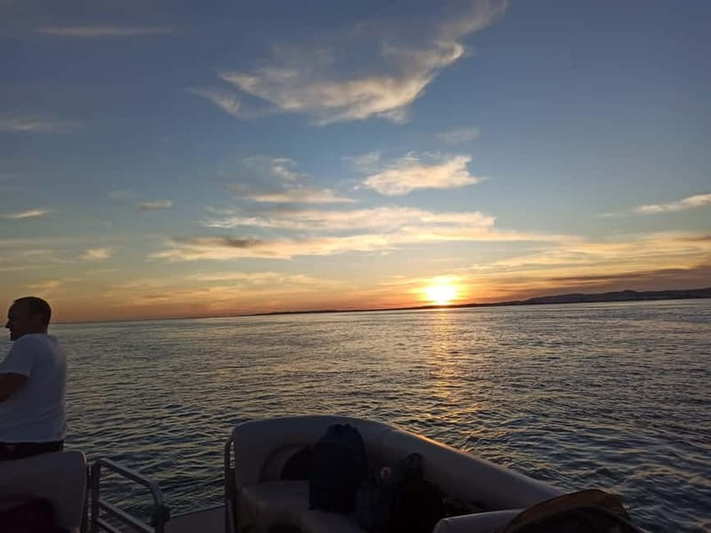 Faro: Sunset 1 hour Ria Formosa Boat Tour - Cruising into Ria Formosa at sunset