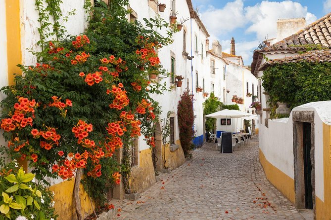Fátima, Nazaré, and Óbidos: Small Group Tour From Lisbon - Óbidos: Portugal’s medieval postcard, with a sweet finish