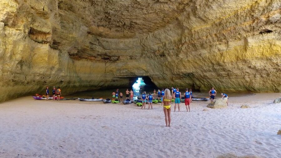 From Albufeira: Benagil Hidden Caves Tour by Kayak - Returning to the boat and taking a swim