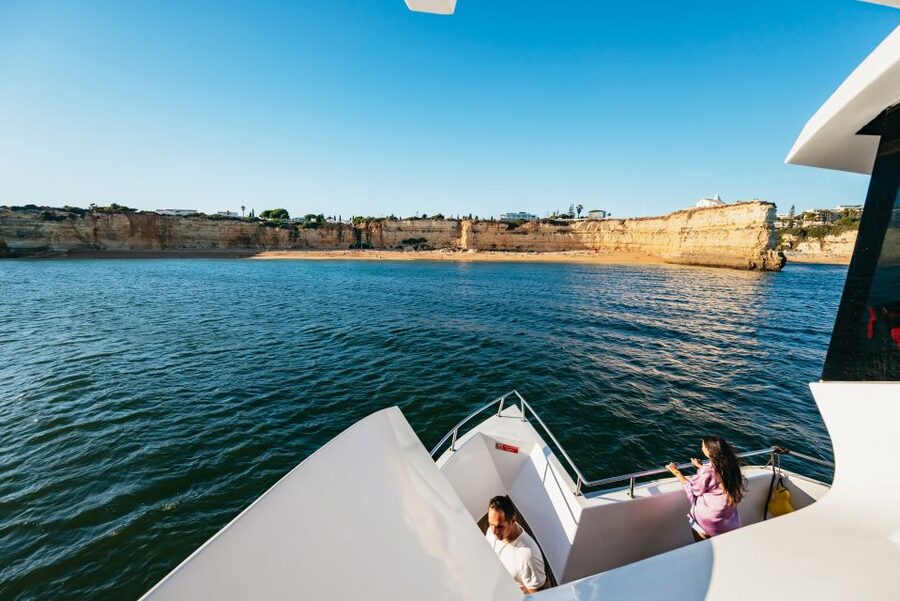 From Albufeira: Sunset Cruise and Beach BBQ with Open Bar - The open bar and evening atmosphere
