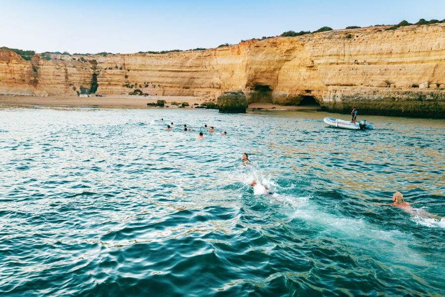 From Albufeira: Sunset Cruise and Beach BBQ with Open Bar - Music, fire performance, and the return cruise