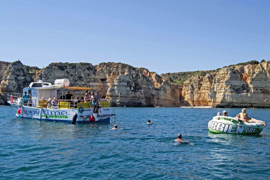 From Lagos: 2.5-Hour Guided Coastal Boat Tour & Grotto Visit - Shade, seating, drinks, and other useful comforts