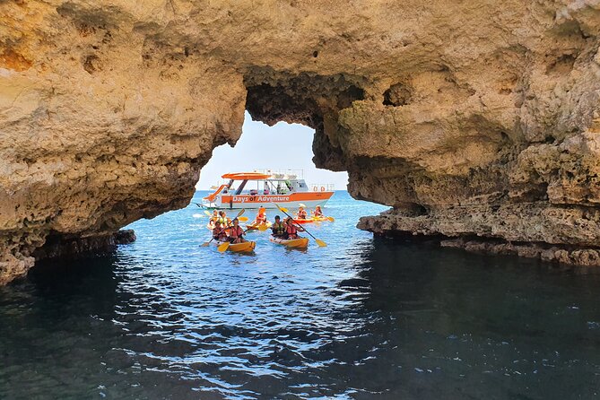 From Lagos: Kayak Tour of Ponta da Piedade Caves on Catamaran - Entering the caves and passing the cliffs