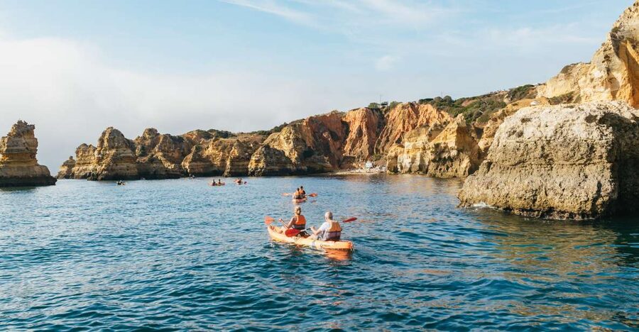 From Lagos: Kayaking and Boat Cave Explorer Tour - The boat ride and the change to kayaks