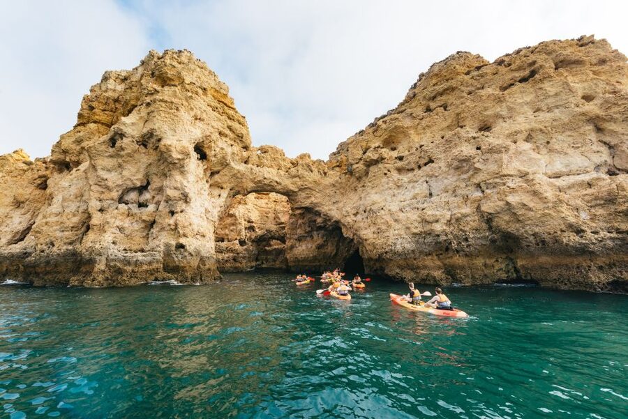 From Lagos: Kayaking and Boat Cave Explorer Tour - The swim stop from the support boat
