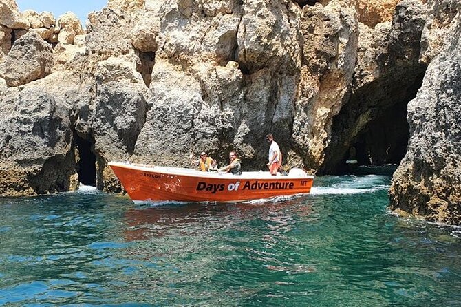From Lagos: Ponta da Piedade Caves Boat Tour - A low-profile boat built for narrow caves
