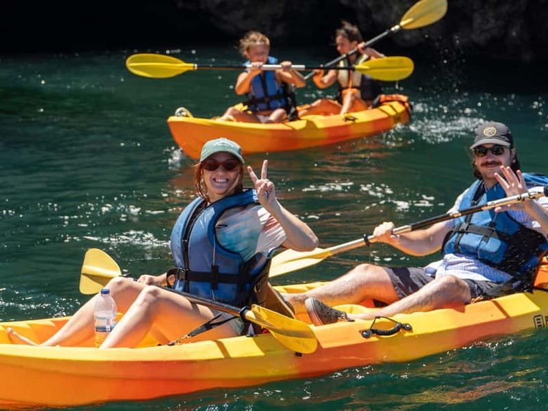 From Lagos: Ponta da Piedade Caves Kayak Tour from Catamaran - The swim stop and onboard slide