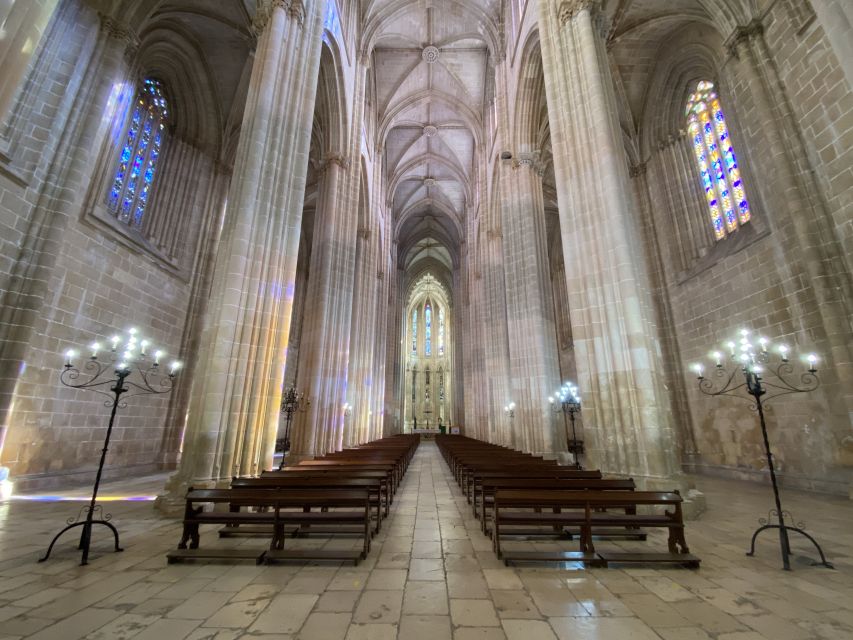 From Lisbon: Fátima, Batalha, Nazaré, and Obidos Tour by Van - Batalha Monastery and the 1385 battle