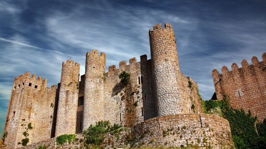 From Lisbon: Fátima, Batalha, Nazaré & Óbidos Full-Day Tour - Batalha Monastery and the battle that shaped it