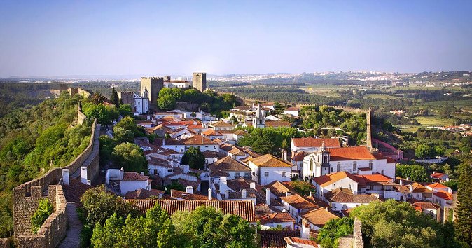 From Lisbon: Fátima, Nazaré, Batalha, and Óbidos Guided Tour - What the guides add to a fast-moving route