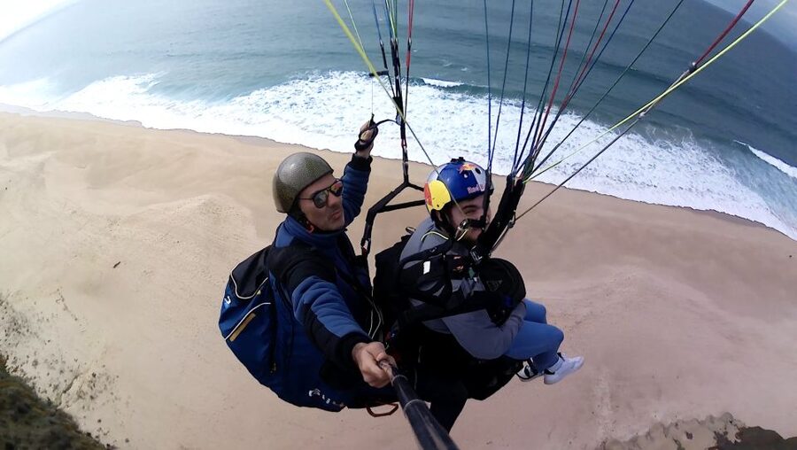 From Lisbon: Paragliding Tandem Flight - Shared transport from Lisbon