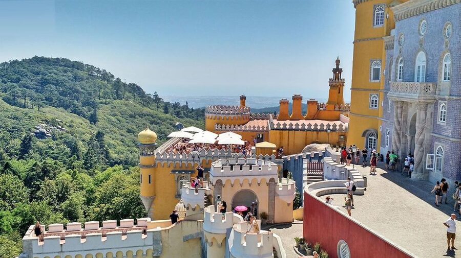 From Lisbon: Sintra Pena Regaleira Roca Cap Cascais Tour - The guide and vehicle shape the whole experience