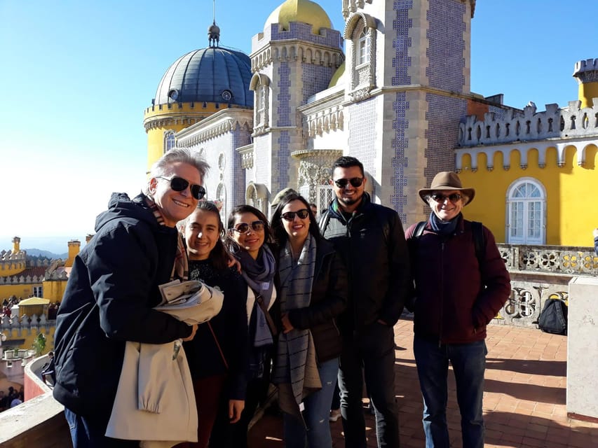 From Lisbon: Sintra Pena Regaleira Roca Cap Cascais Tour - Pena Palace starts the day with color and drama