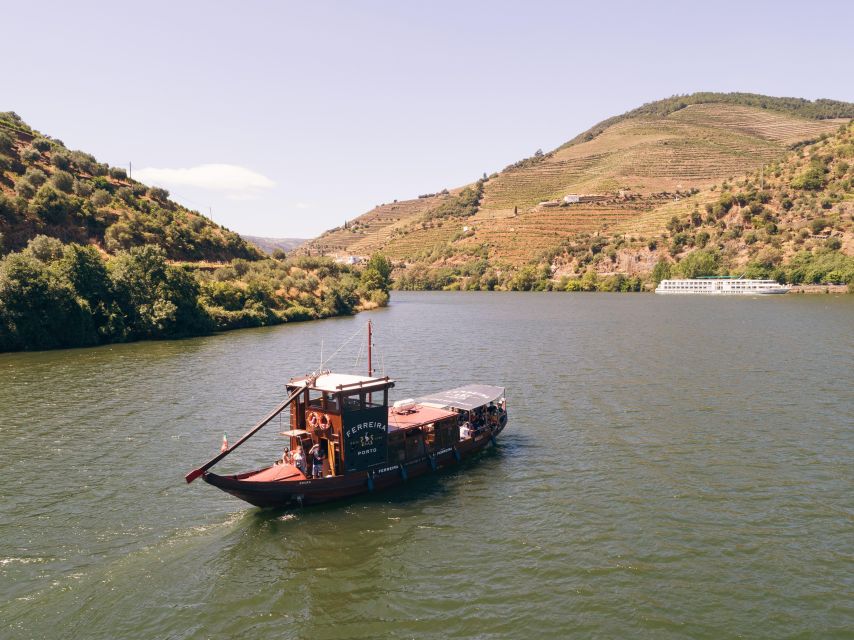 From Pinhão: Douro Valley Rabelo Boat Tour with Audio Guide - Leaving Pinhão beside Quinta do Bomfim