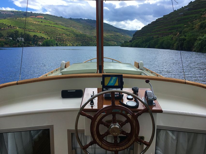 From Pinhão: Private Yacht Cruise along the Douro River - The yacht, deck, cabin, and views