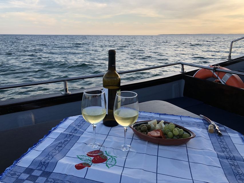 From Portimão: Sunset Boat Trip with Wine - A swim away from the crowded shore