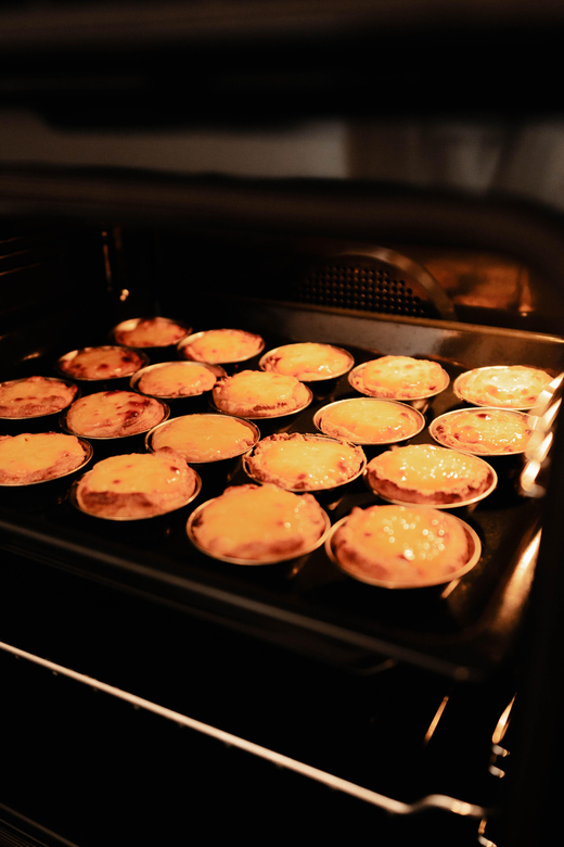 Lagos: Bake Pastel de Nata – Class in Lagos, Algarve - Step three: combining, baking, and waiting with port