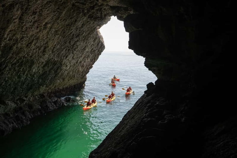 Lisbon: Arrabida Park Kayak Tour with Beach Picnic - Sesimbra safety briefing and kayak setup