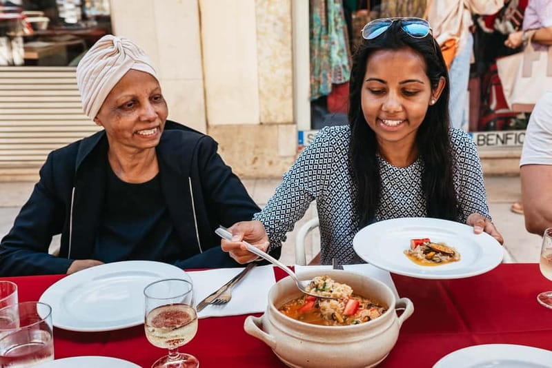 Lisbon: Baixa District Food Tour with Dinner and Drinks - Praça Dom Pedro IV and the Rossio pause