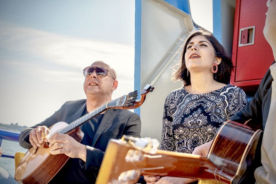 Lisbon: Boat Cruise with Live Fado Performance and a Drink - Commerce Square from the water
