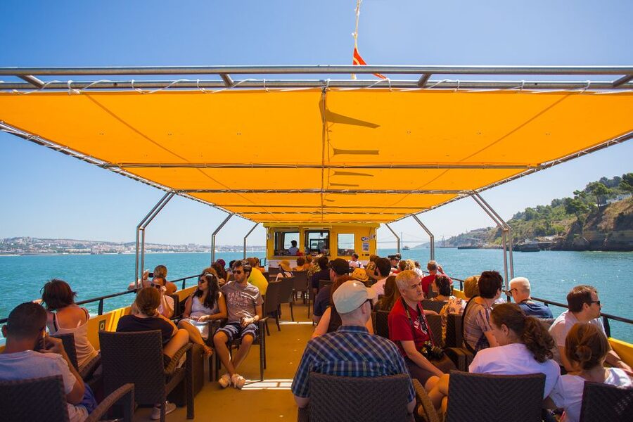 Lisbon: Boat Tour Ticket and Hop-on Hop-off 48-Hour Bus. - Riding west to Belém