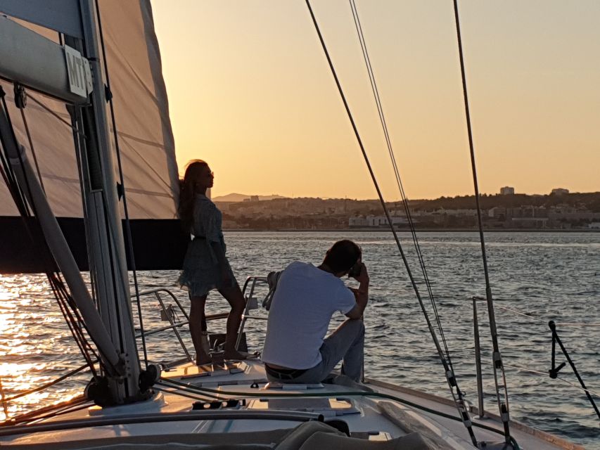 Lisbon: Champagne Sailing Tours - Christ the King across the river