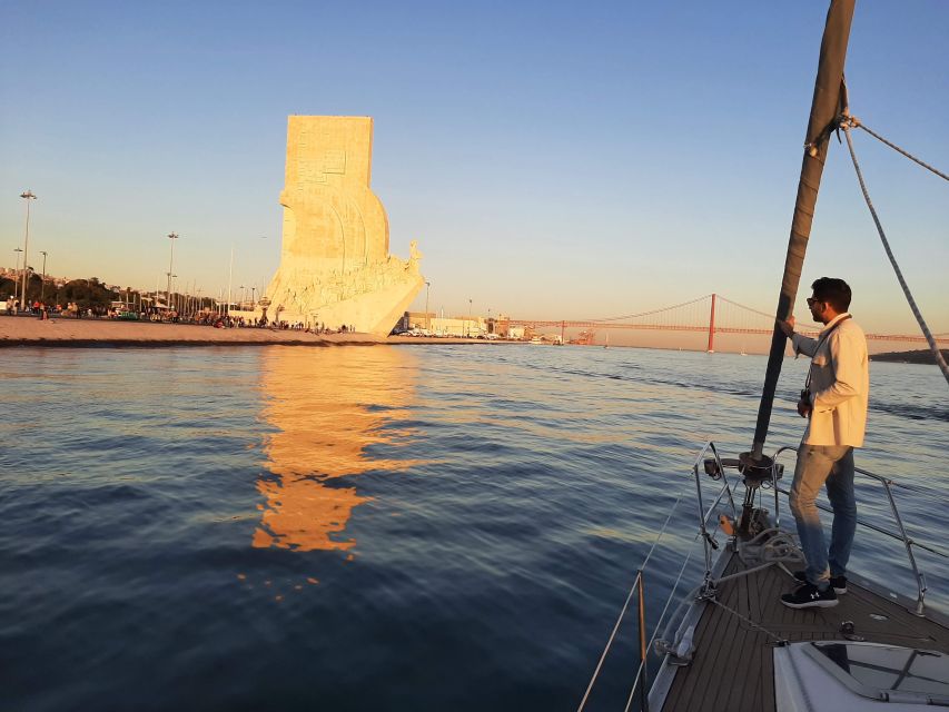 Lisbon: City Skyline Sailboat Cruise with Drink and Snacks - A drink, local snacks, and time to slow down