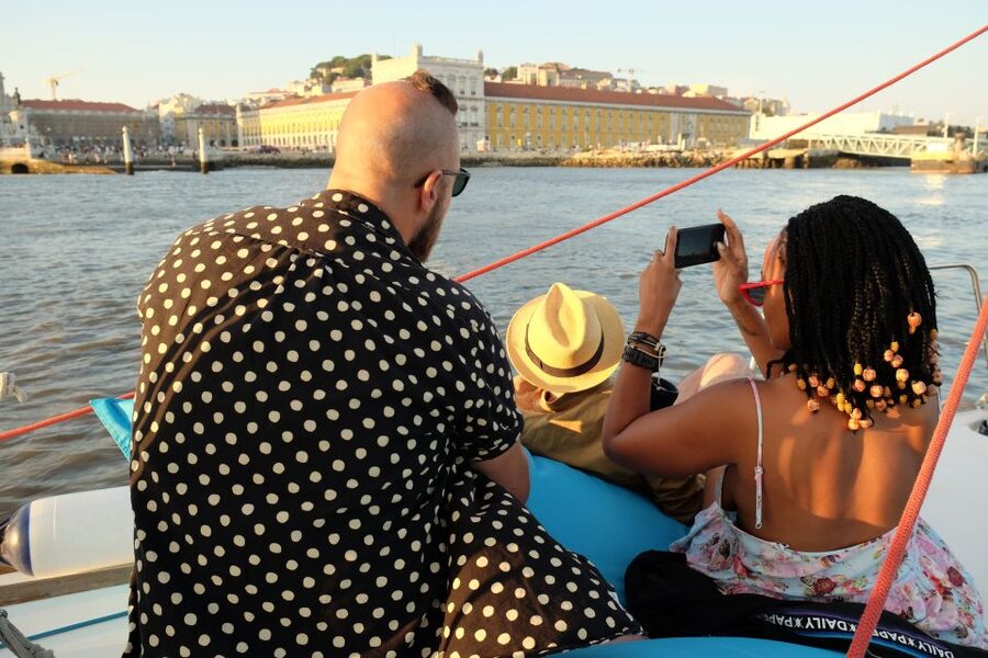 Lisbon: City Skyline Sailboat Cruise with Drink and Snacks - Sunset sailing, weather, and what to wear