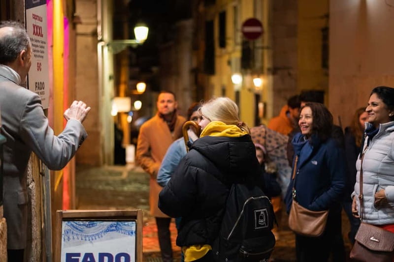 Lisbon: Fado Musical Experience with Portuguese Appetizers - Meeting the yellow umbrella at Rossio Square
