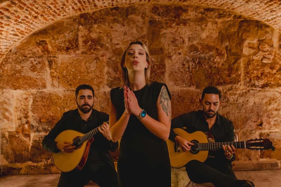 Lisbon: Fado Show with Wine in a Historic Venue - Entering Fado beside Lisbon Sé Cathedral