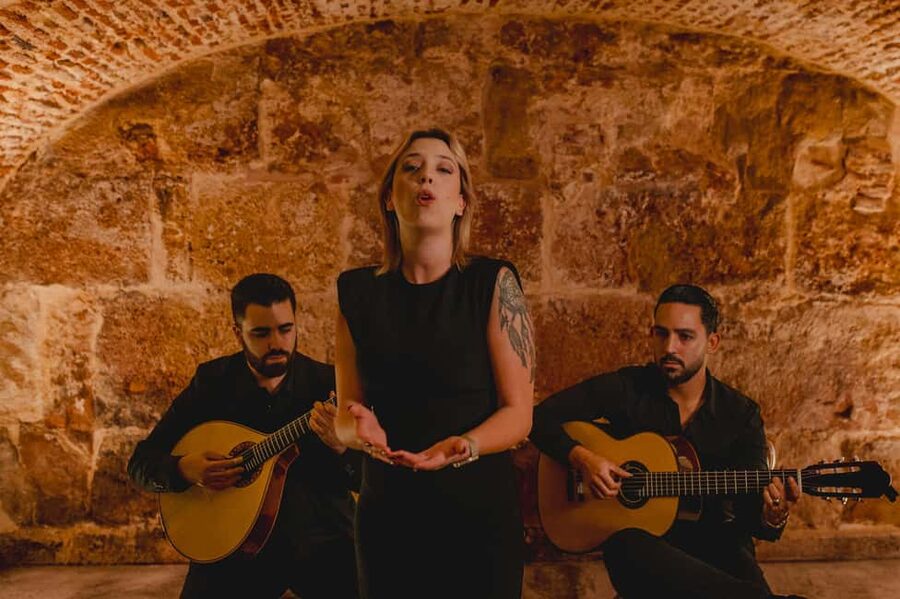 Lisbon: Fado Show with Wine in a Historic Venue - Two singers and a close-up view of the musicians