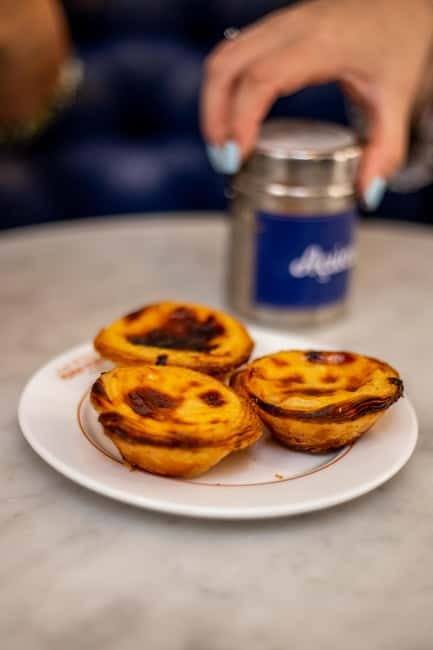 Lisbon: Food Tasting Tour by Tuk Tuk with 2 Stops - Baixa returns with a sweet finish