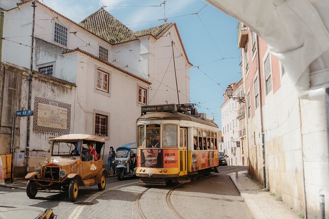 Lisbon Food & Tuk Tuk Tour with Eating Europe - Walking through Alfama’s narrow streets