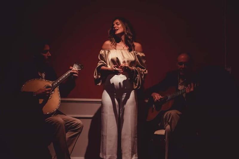 Lisbon: Live Fado Show with Port Wine in Historic Center - The Singers, Guitarists, and Audience Connection