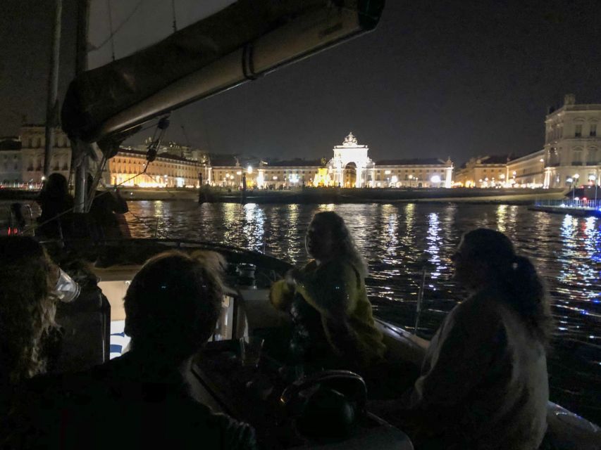 Lisbon: Luxury Sailboat Cruise at Night - Alfama from the water