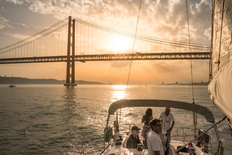 Lisbon: Private Sunset Cruise on the Tagus River with Drink - Cristo-Rei at the end of the light
