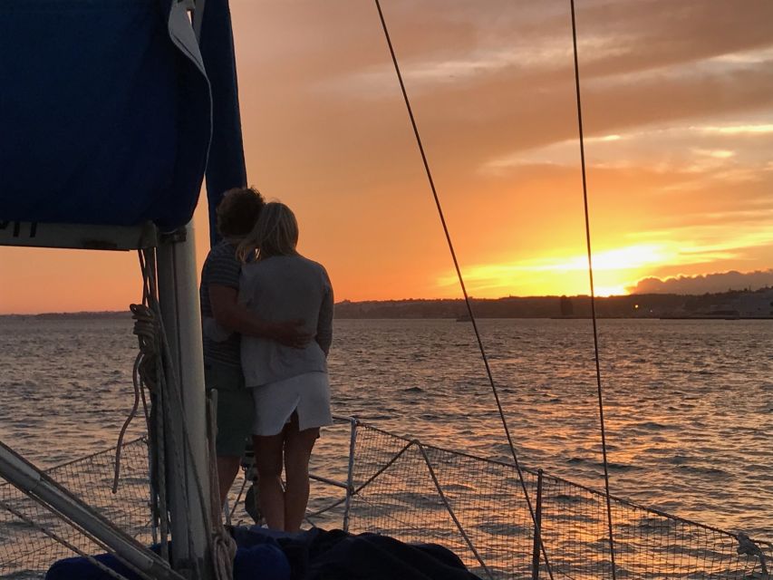 Lisbon: Private Sunset Sailing Tour with Champagne - Leaving Belém beside the Tower